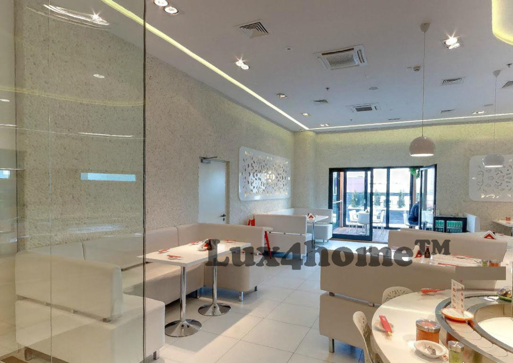 Białe otoczaki na ścianach — realizacja Tokyo Sushi w Warszawie 19 Białe otoczaki WHITE TIMOR na ścianach jasnej sali restauracji Tokyo Sushi