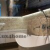 Mozaika z otoczaków White Timor Mozaika z otoczaków White Timor na ścianach przy wannie i umywalce