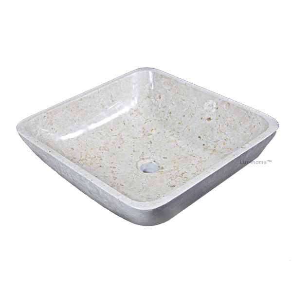 Umywalka kamienna Umywalka kamienna – kwadratowa misa o zaokrąglonych bokach, ujęcie ukośne